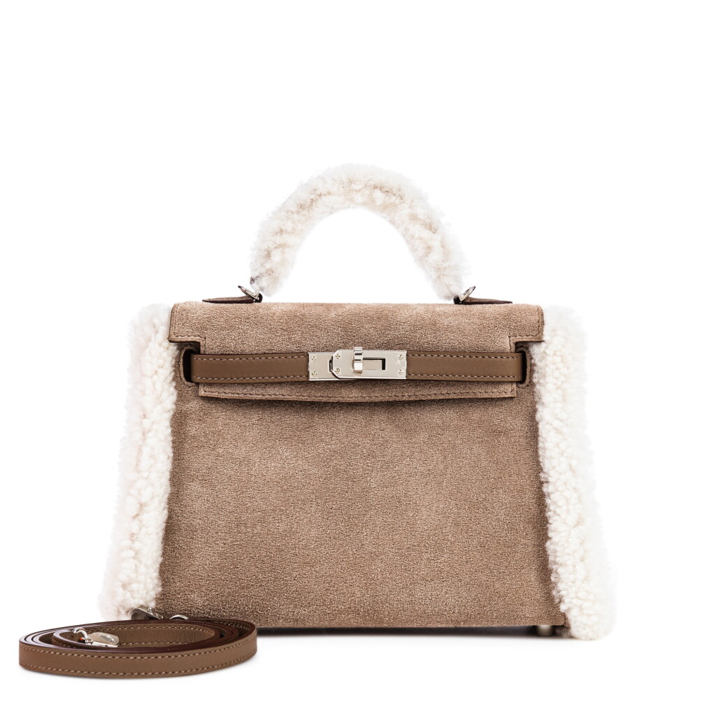 View full screen - View 1 of Lot 150. Limited Edition Gris Caillou Chamois Grizzly, Etoupe Swift and Ecru Shearling Teddy Plush Mini Kelly II 20 Palladium Hardware, 2023.