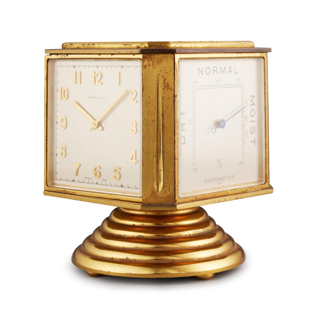 View full screen - View 1 of Lot 90. A gilt brass 8 day desk compendium with thermometer, barometer, and hygrometer, Circa 1950.