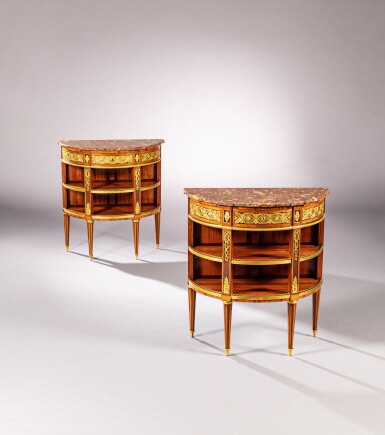 View full screen - View 1 of Lot 47. A pair of Louis XVI tulipwood and amaranth marquetry with gilt-bronze mount console dessertes, circa 1780 | Paire de consoles desserte en marqueterie d'amarante et bois de rose, monture de bronze doré d'époque Louis XVI, vers 1780.