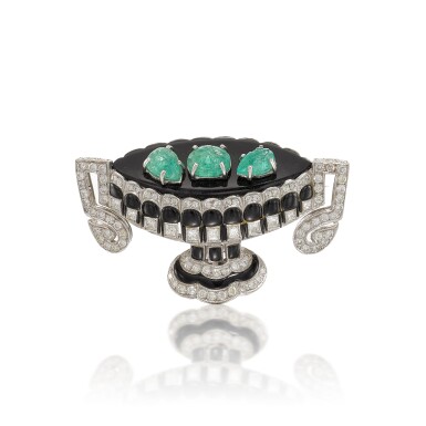 View full screen - View 1 of Lot 228. An emerald, onyx and diamond brooch.
