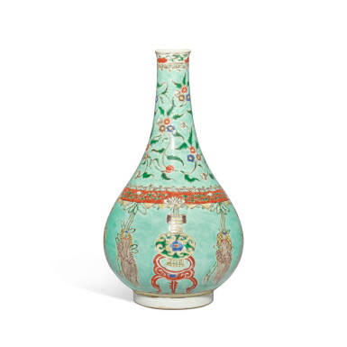 View full screen - View 1 of Lot 584. A pale-green-ground famille-verte 'antiques' bottle vase, Qing dynasty, Kangxi period | 清康熙 綠地五彩寶壺紋長頸瓶.