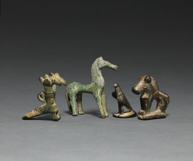View full screen - View 1 of Lot 19. A GROUP OF FOUR BRONZE CREATURES, 8TH CENTURY B.C/3RD CENTURY A.D..