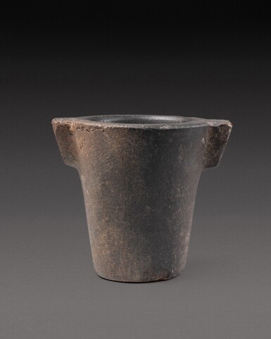 View full screen - View 1 of Lot 159. An Egyptian Basalt Mortar, Ptolemaic Period, 305-30 B.C..
