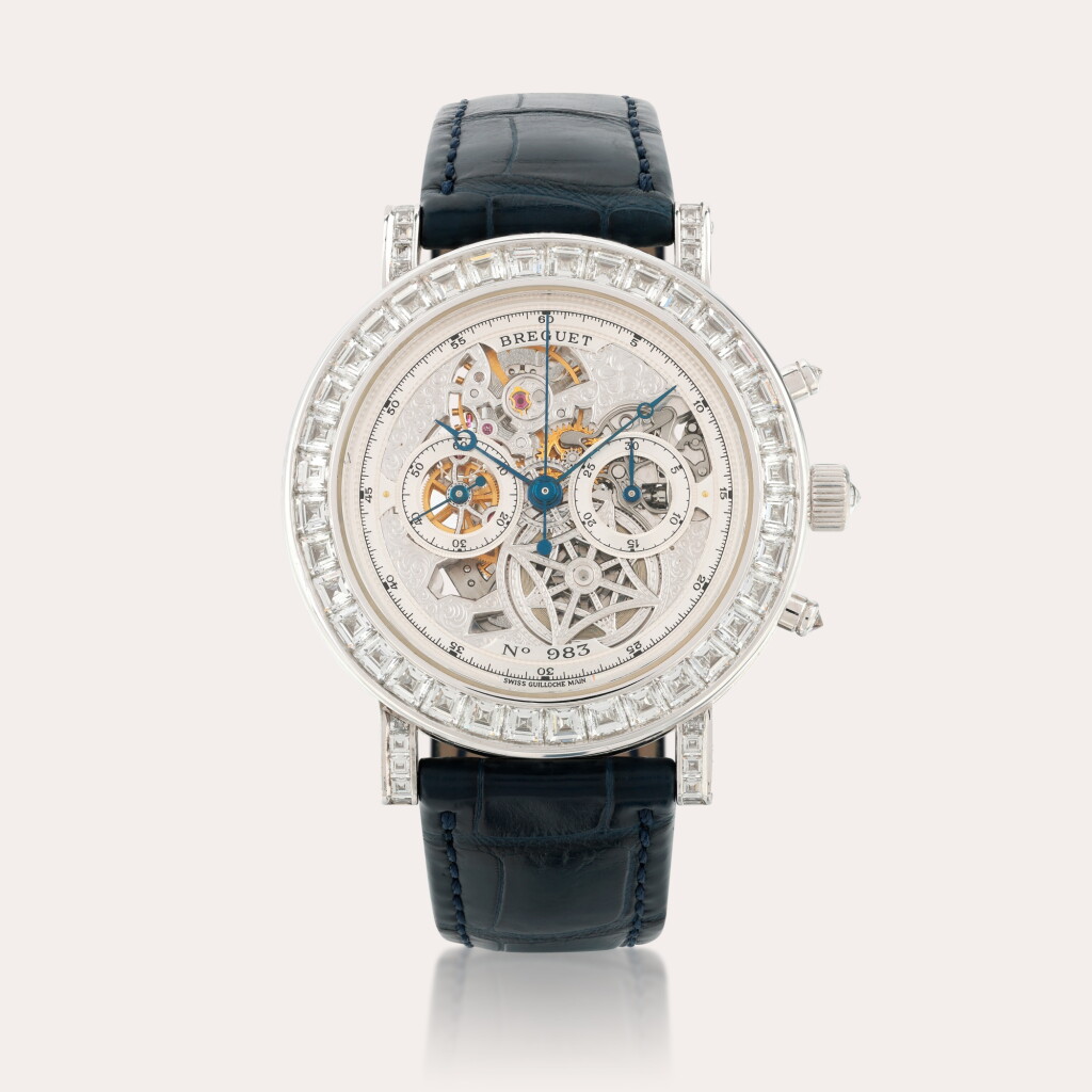 View full screen - View 1 of Lot 34. An impressive 18ct white gold and diamond-set skeletonized chronograph wristwatch with register.