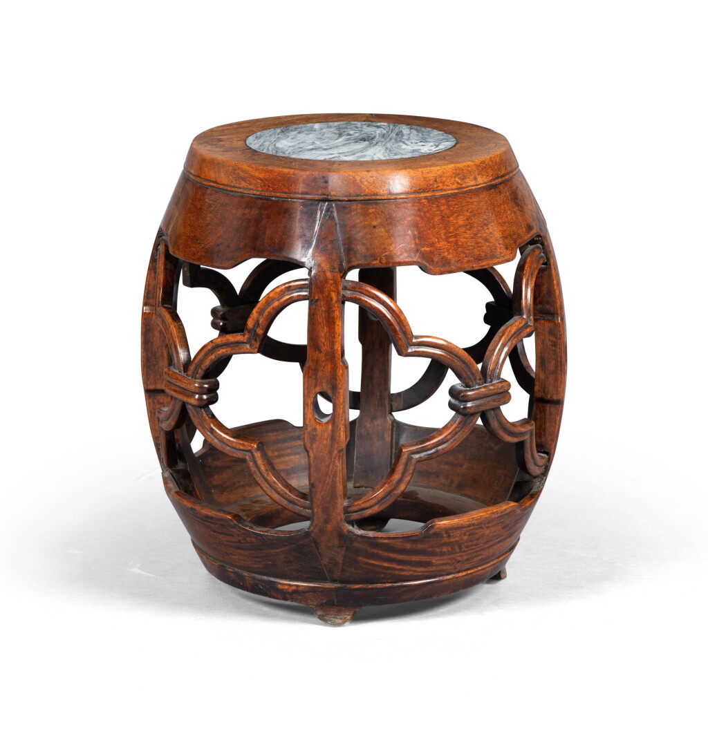 View full screen - View 1 of Lot 182. Tabouret en huali en forme de tambour Dynastie Qing, XIXE siècle | 清十九世紀 花梨木嵌大理石面鼓型坐墩 | A huali marble top barrel-shaped reticulated stool.