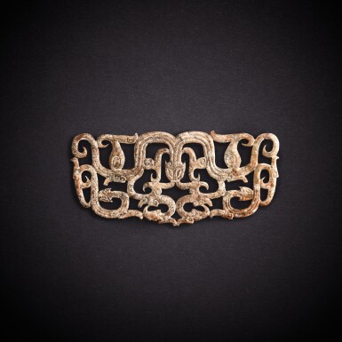 View full screen - View 1 of Lot 5651. A white jade reticulated 'dragon' pendant, Eastern Zhou dynasty, Spring and Autumn period | 東周春秋 白玉鏤雕龍紋珮.