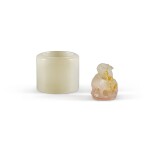 A white jade archer's ring and a small white jade 'dragon' seal Qing dynasty, 19th century | 清十九世紀 白玉扳指 及 白玉瑞獸鈕印 一組兩件