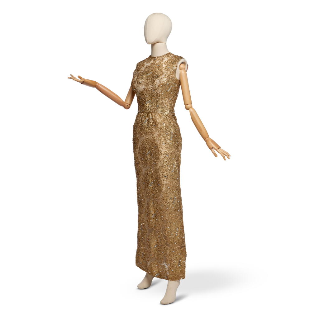 View full screen - View 1 of Lot 44. Maria Ellington Cole, Mrs. Nat King Cole, Gold Lace Evening Gown, 1960s.