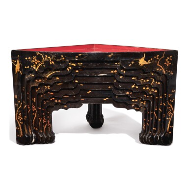 View full screen - View 1 of Lot 556. A SET OF SEVEN CHINESE BLACK, RED, AND GOLD LACQUER STACKING TABLES.