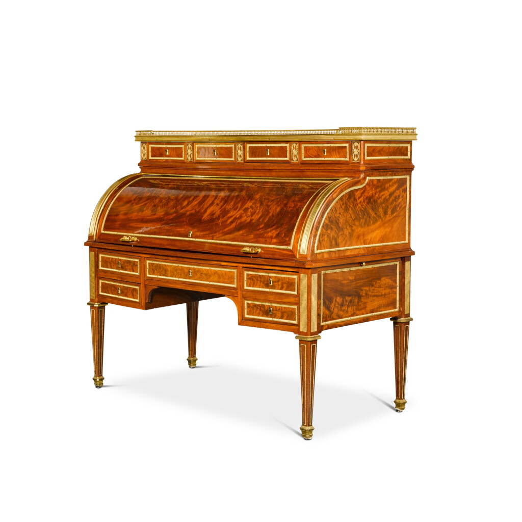 View full screen - View 1 of Lot 14. A Louis XVI gilt-bronze mounted mahogany cylinder bureau attributed to François Ignace Papst, circa 1790.