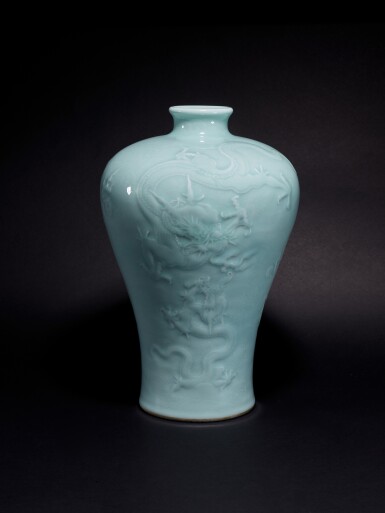 View full screen - View 1 of Lot 3612. A fine, superb and possibly unique carved celadon-glazed 'dragon' vase, meiping, Seal mark and period of Qianlong | 清乾隆 粉青釉淺浮雕五龍圖梅瓶 《大清乾隆年製》款.
