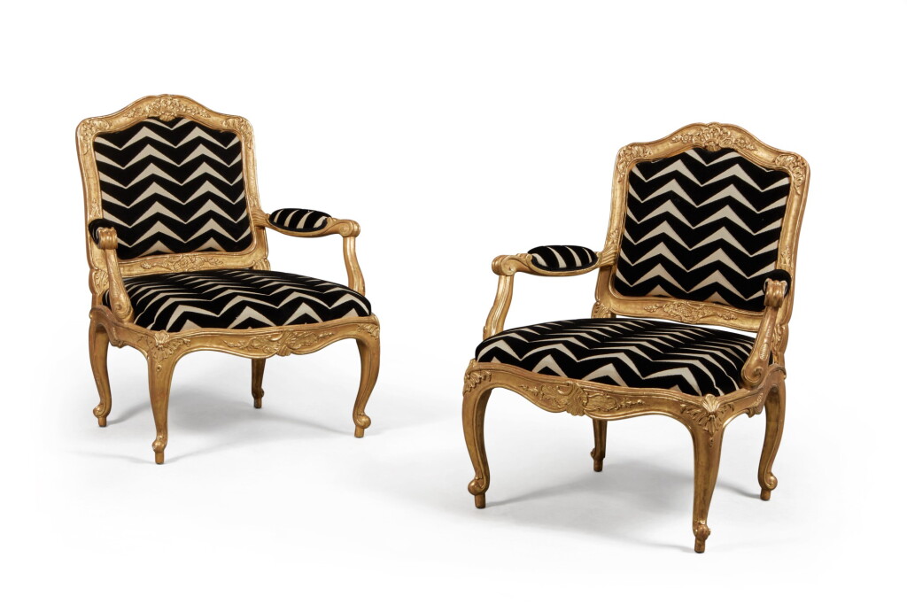 View full screen - View 1 of Lot 259. A Pair of Continental Rococo Giltwood Armchairs, Probably Swedish, Mid-18th Century.