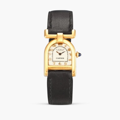 View full screen - View 1 of Lot 2291. E. Gübelin, Lucerne retailed | Étrier | A yellow gold stirrup-form wristwatch, Circa 1929.