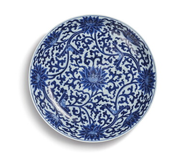 View full screen - View 1 of Lot 337. A large blue and white 'lotus' dish, Mark and period of Kangxi | 清康熙 青花纏枝蓮紋大盤 《大清康熙年製》款.