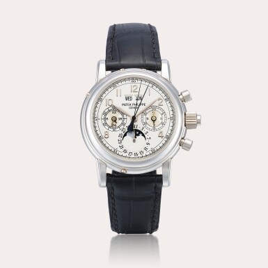 View full screen - View 1 of Lot 2274. Reference 5004 | A platinum perpetual calendar split seconds chronograph wristwatch with moon phases, 24 hours, leap year indication and two-tone registers, Circa 2009.
