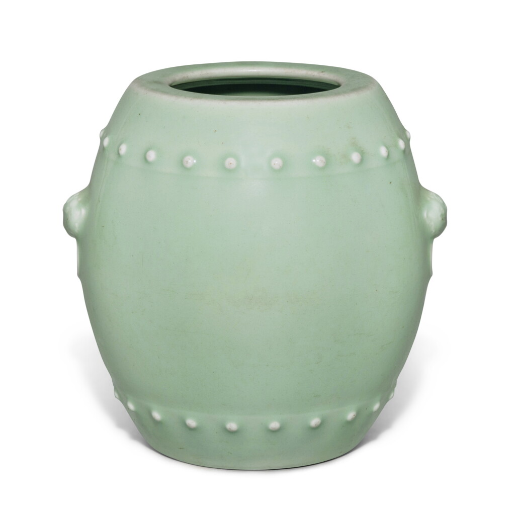 View full screen - View 1 of Lot 705. A celadon-glazed drum-shaped vase, Seal mark and period of Qianlong | 清乾隆 粉青釉鋪首耳鼓式罐 《大清乾隆年製》款.