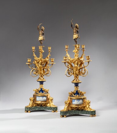View full screen - View 1 of Lot 183. A pair of patinated and gilt-bronze six-light candelabra of the "Independance of America", signed by Alfred Beurdeley (1847-1919), second half 19th century | Paire de candélabres à six lumières de "L'Indépendance Américaine" en bronze patiné et doré, signés par Alfred Beurdeley (1847-1919), d'après le modèle de Pierre-Philippe Thomire, deuxième moitié du XIXe siècle.