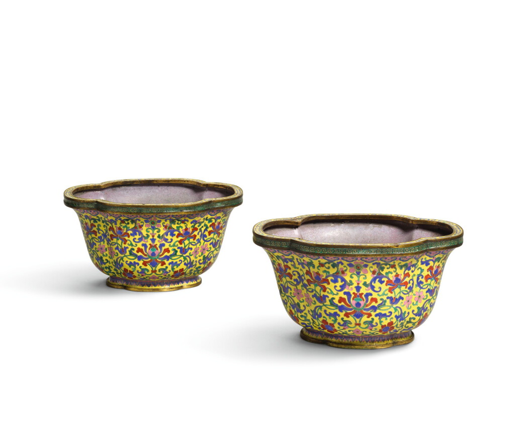 View full screen - View 1 of Lot 283. A PAIR OF PAINTED ENAMEL JARDINIERES, QIANLONG MARKS AND PERIOD | 清乾隆 黃地銅胎畫琺瑯蓮紋海棠式花盆一對 《乾隆年製》款.