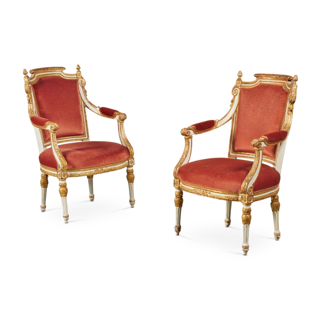 View full screen - View 1 of Lot 715. A Pair of Dutch Louis XVI Parcel-Gilt White Painted Fauteuils à la Reine, late 18th Century.