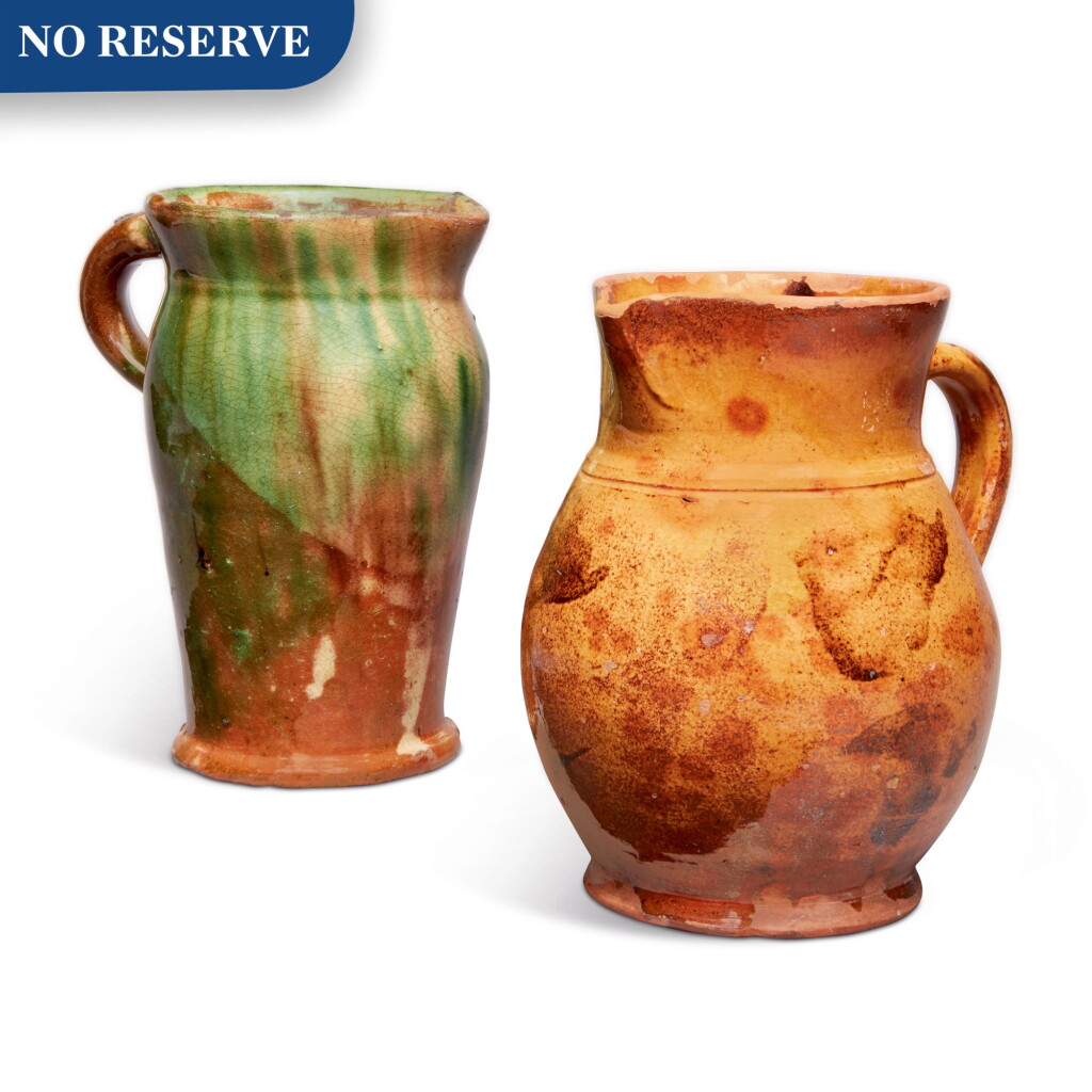 View full screen - View 1 of Lot 301. Two Glazed Redware Milk Jugs, attributed to the Bell Pottery, Shenandoah Valley, Virginia, circa 1845.