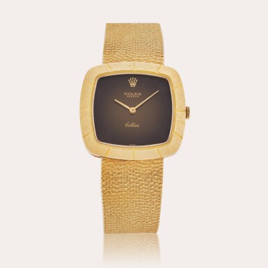 View full screen - View 1 of Lot 357. Reference 3830 J Cellini | A yellow gold cushion shaped bracelet watch, Circa 1971.