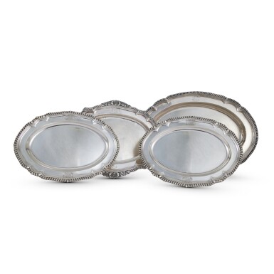 View full screen - View 1 of Lot 180. A Group of Georgian Silver Meat Platters, London, Late 18th And Early 19th Century.