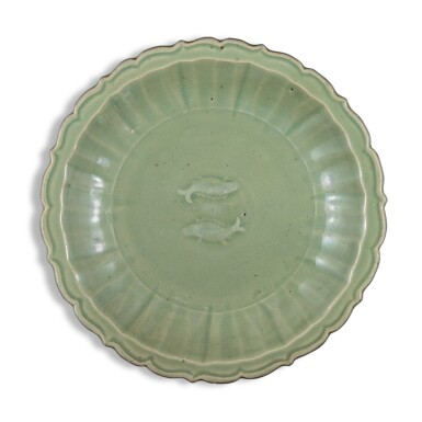 View full screen - View 1 of Lot 4. A large molded 'Longquan' celadon-glazed 'twin fish' charger, Early Ming dynasty.