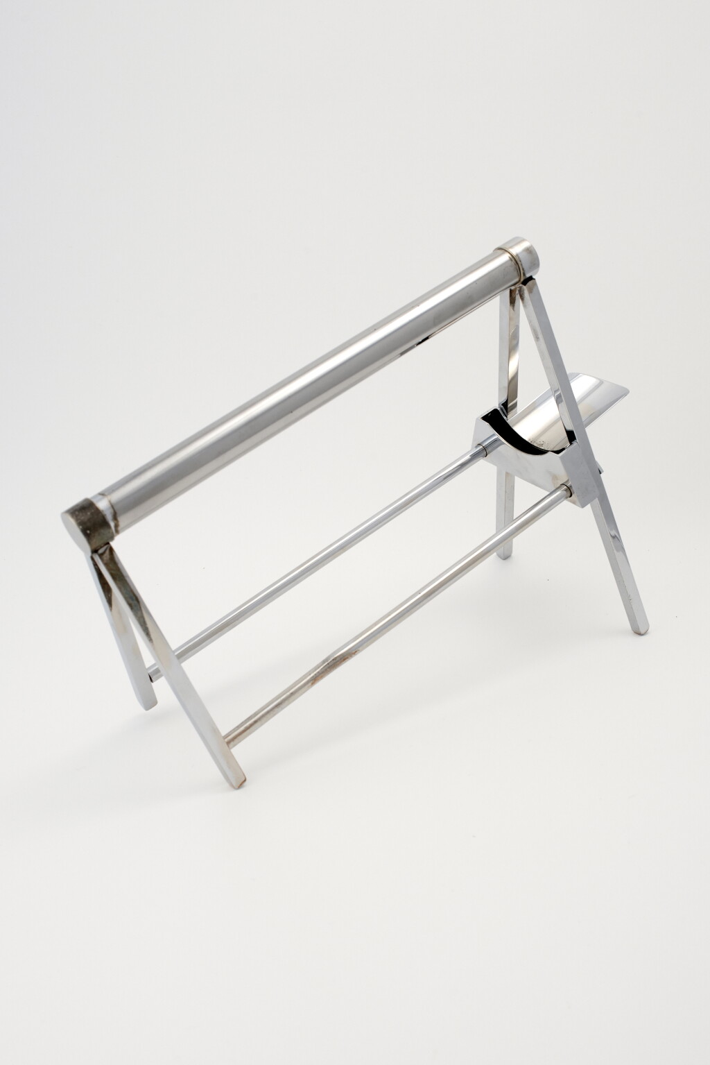View full screen - View 1 of Lot 32. A FRENCH CHROME-PLATED WINE BOTTLE HOLDER .