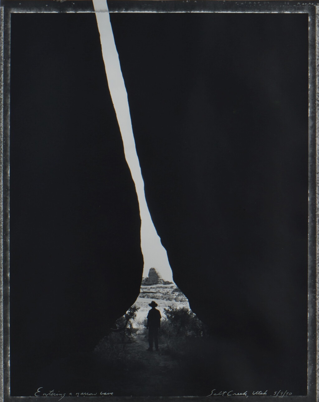 View full screen - View 1 of Lot 635. Entering a Narrow Cave, Salt Creek, Utah 5/9/90.