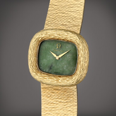 View full screen - View 1 of Lot 277. A yellow gold cushion shaped wristwatch with jade dial, Designed by Roy King, Circa 1971.