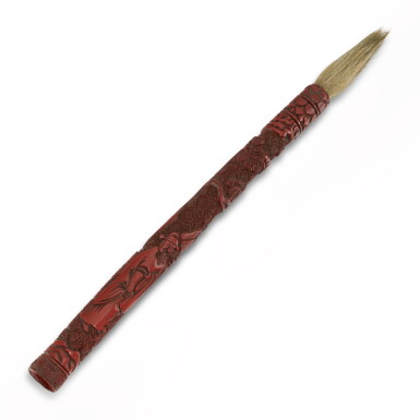 View full screen - View 1 of Lot 140. A carved cinnabar lacquer ‘figural' brush, Ming dynasty, 16th century .