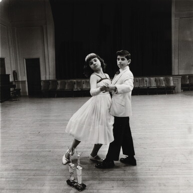 View full screen - View 1 of Lot 22. DIANE ARBUS | THE JUNIOR INTERSTATE BALLROOM DANCE CHAMPIONS, YONCKERS NY, 1962.