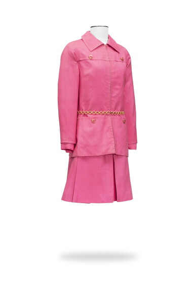 View full screen - View 1 of Lot 7. Nina Ricci, Haute Couture, circa 1968, Zipped jacket with belt, blouse and pleated skirt | Tailleur, veste longue zippée avec ceinture, blouse et jupe plissée.