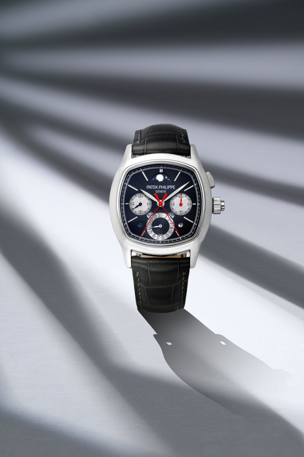 View full screen - View 1 of Lot 341. Reference 5951P-001 | A platinum perpetual calendar split seconds chronograph wristwatch with moon phases, leap year and day and night indication | Circa 2012.