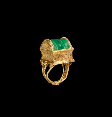 View full screen - View 1 of Lot 58. A Late Hellenistic Gold and Emerald Finger Ring, circa 1st Century B.C..