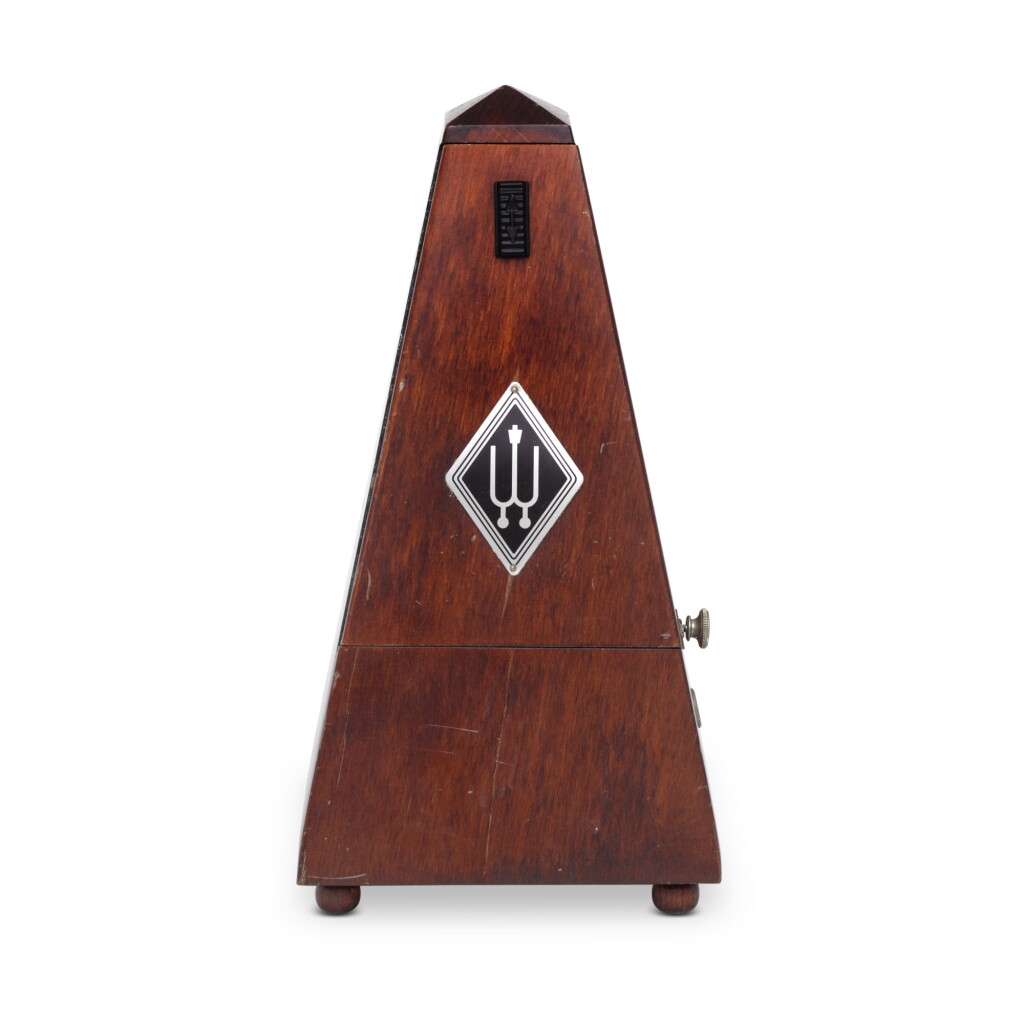 View full screen - View 1 of Lot 2223. A German stained beech cased metronome by Wittner, 1970s.