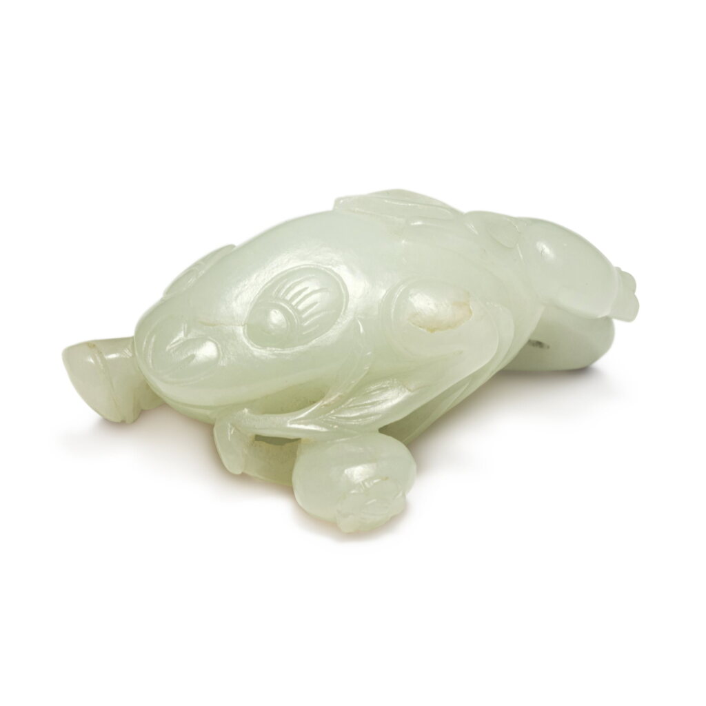 View full screen - View 1 of Lot 648. A white jade carving of a three-legged toad, Qing dynasty, 19th / 20th century | 清十九 / 二十世紀 白玉雕金蟾石榴把件.