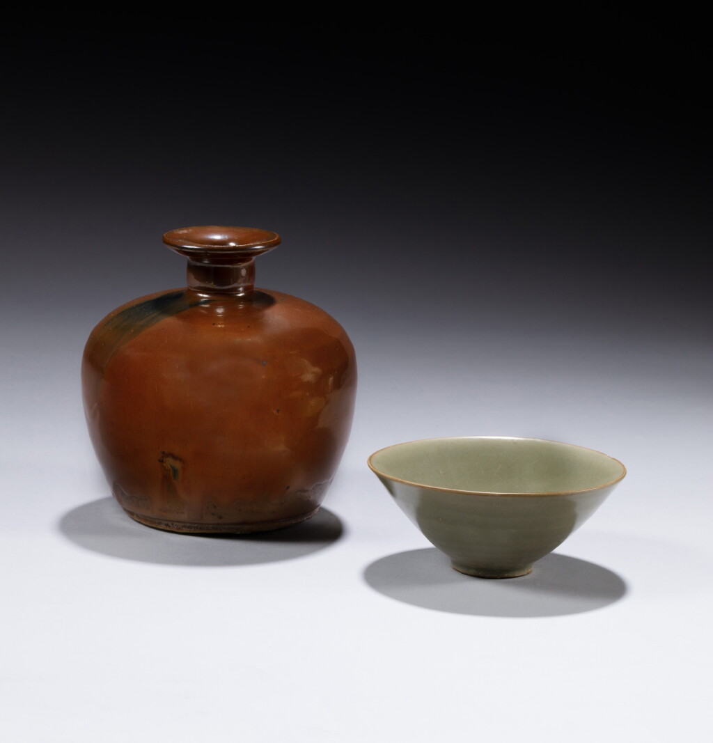View full screen - View 1 of Lot 43. A russet-glazed bottle vase and a 'Yaozhou' celadon-glazed cup, Song - Yuan dynasty | 宋至元 醬釉瓶 及 耀州青窰盌.