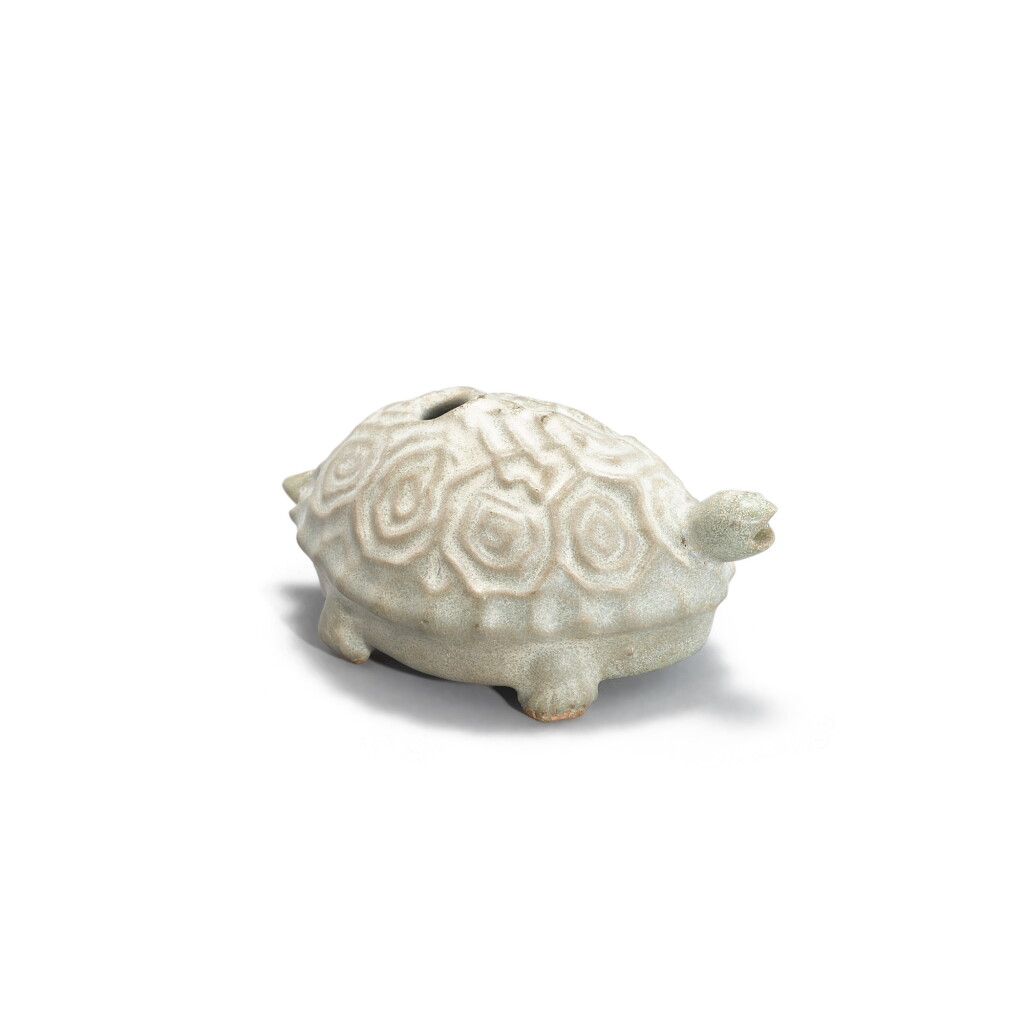 View full screen - View 1 of Lot 315. An inscribed celadon-glazed 'turtle' water dropper, Song dynasty | 宋 青釉龜形水滴 《及第》《介川二夫滎家》款.
