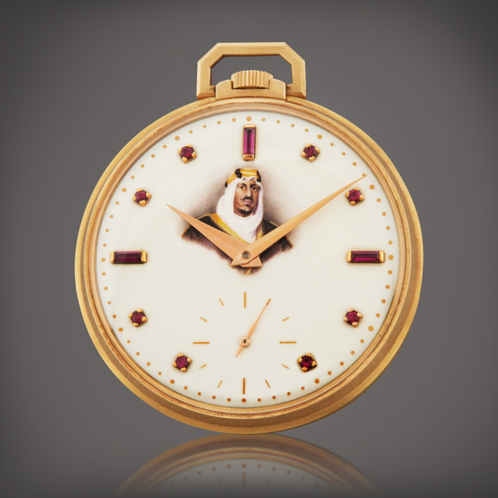 View full screen - View 1 of Lot 245. Reference 600/1 | A rare pink gold and ruby-set open faced watch, made in homage of King Saud Bin Abdulaziz Al Saud, Circa 1956 .