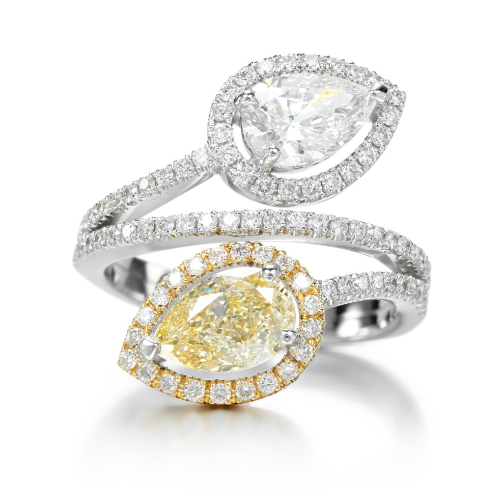View full screen - View 1 of Lot 66. FANCY LIGHT ORANGY-YELLOW DIAMOND AND DIAMOND RING.