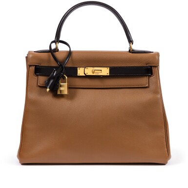 View full screen - View 1 of Lot 409. Vintage Black and Gold Gulliver Kelly 25 Retourné Gold Hardware, 1974.