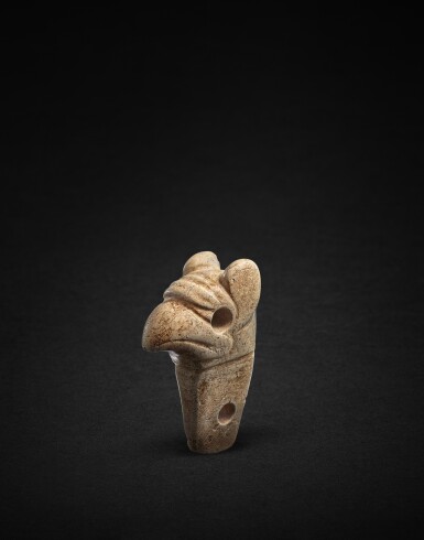 View full screen - View 1 of Lot 925. A calcified jade 'bird' pendant, Neolithic period, Hongshan culture | 新石器時代紅山文化 鳥首玉珮.
