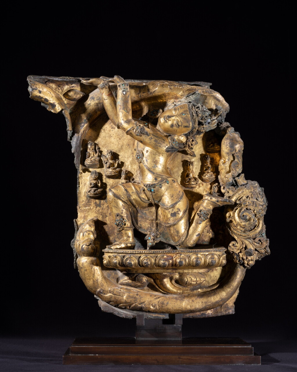View full screen - View 1 of Lot 171. A gilt-copper alloy figure of Nagaraja inlaid with semi-precious stones, Densatil monastery, Tibet, early 15th century | 十五世紀初 藏傳丹薩替寺鎏金銅合金嵌寶石龍尊王像.