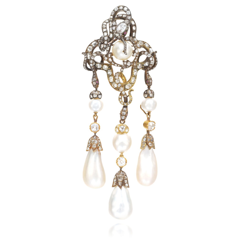 View full screen - View 1 of Lot 552. Natural pearl, ruby and diamond devant-de-corsage, circa 1860 and later.