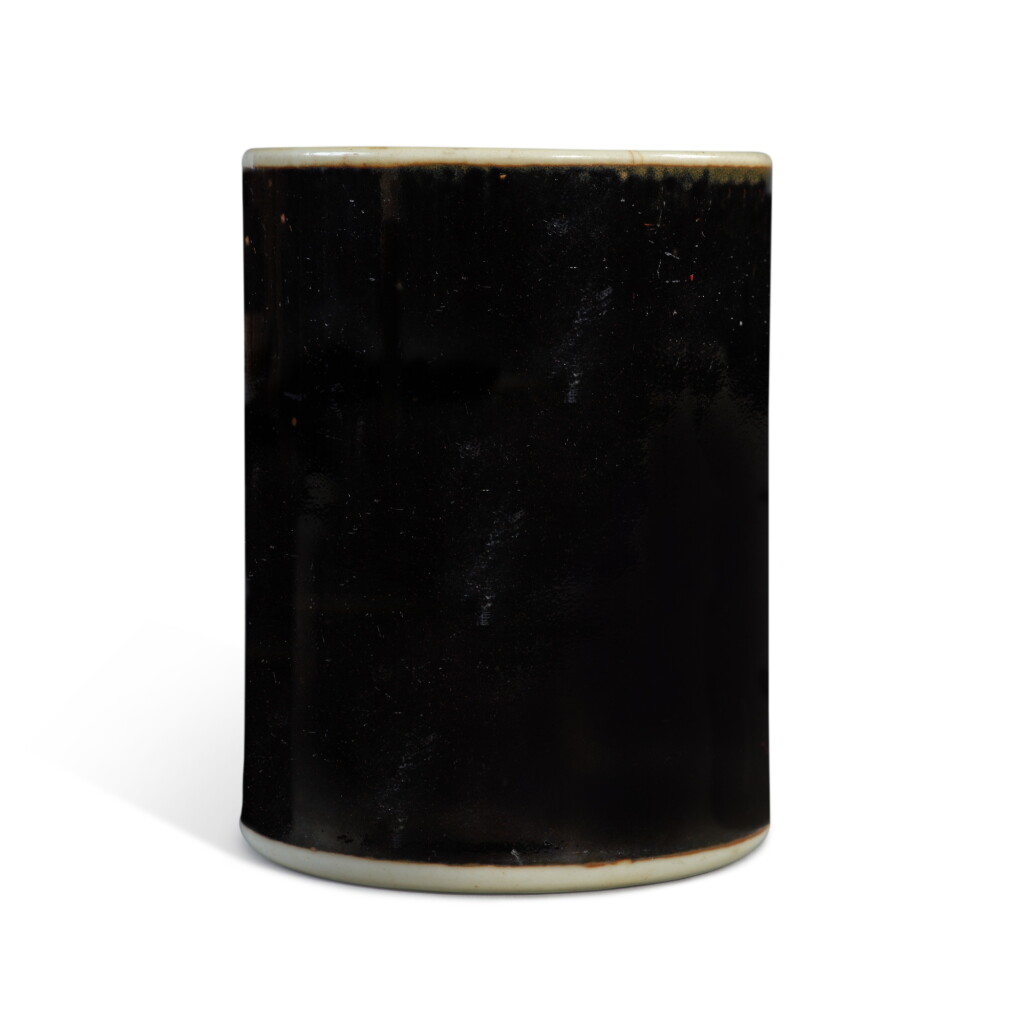 View full screen - View 1 of Lot 6. A small black-glazed brushpot, Qing dynasty, 19th century.