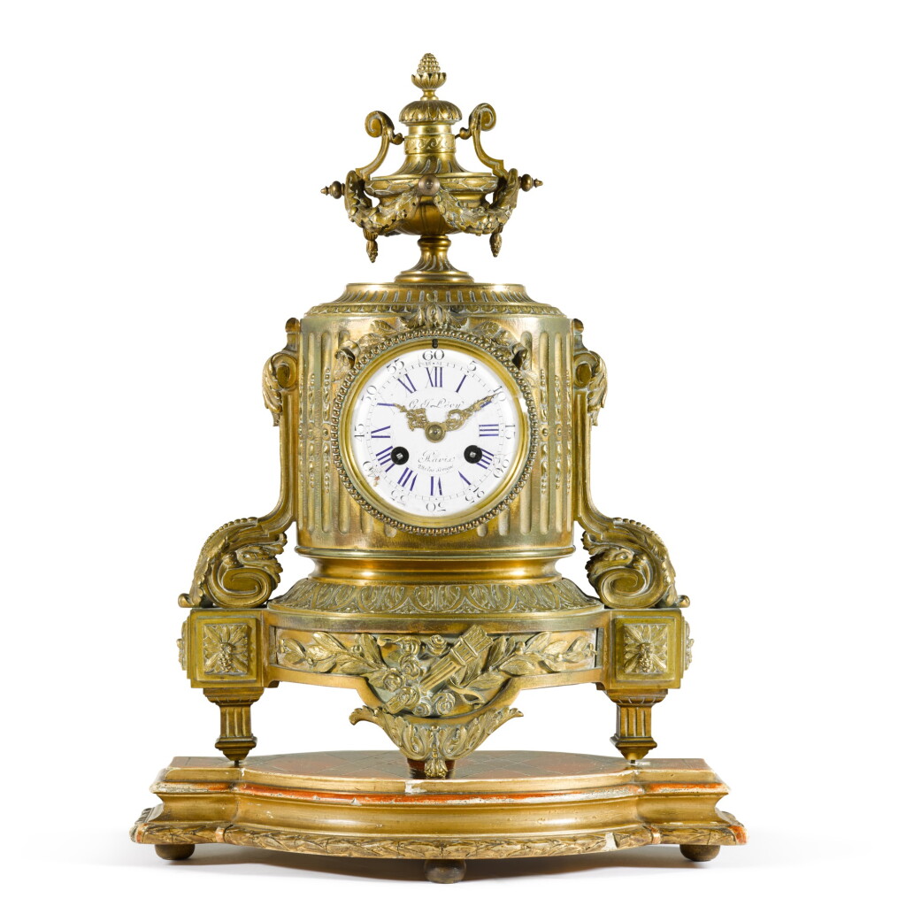 View full screen - View 1 of Lot 51. A Louis XVI-style gilt-bronze mantel clock, circa 1880.