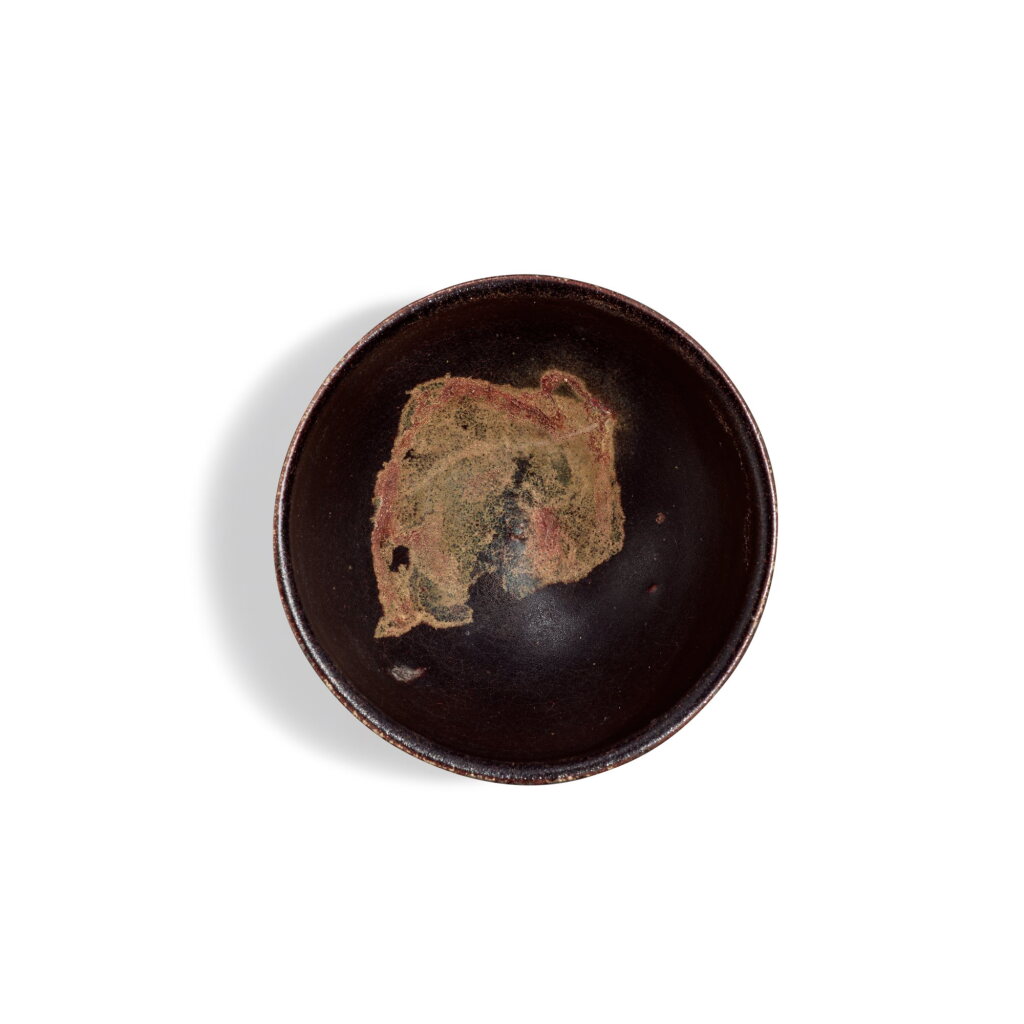 View full screen - View 1 of Lot 313. A rare 'Jizhou' 'leaf' bowl, Northern Song dynasty | 北宋 吉州窰黑釉木葉盞.