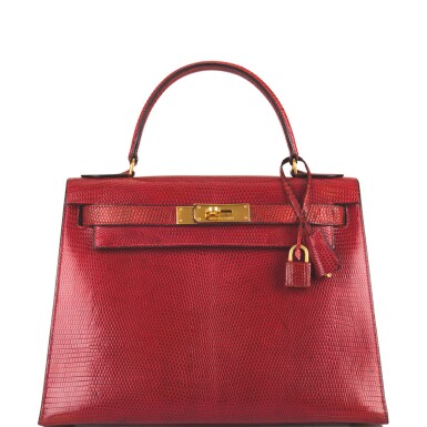 View full screen - View 1 of Lot 18. Hermès Rouge Vif Sellier Kelly 28cm of Niloticus Lizard with Gold Hardware.