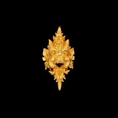 View full screen - View 1 of Lot 1036. A gold 'Makara' ear clip East Java, Indonesia, 13th - 15th century | 十三至十五世紀 印尼東爪哇 摩羯形金耳夾.